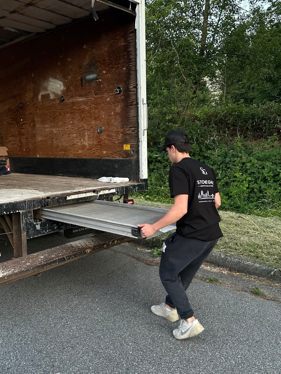 Stonegate crew loading the truck ramp